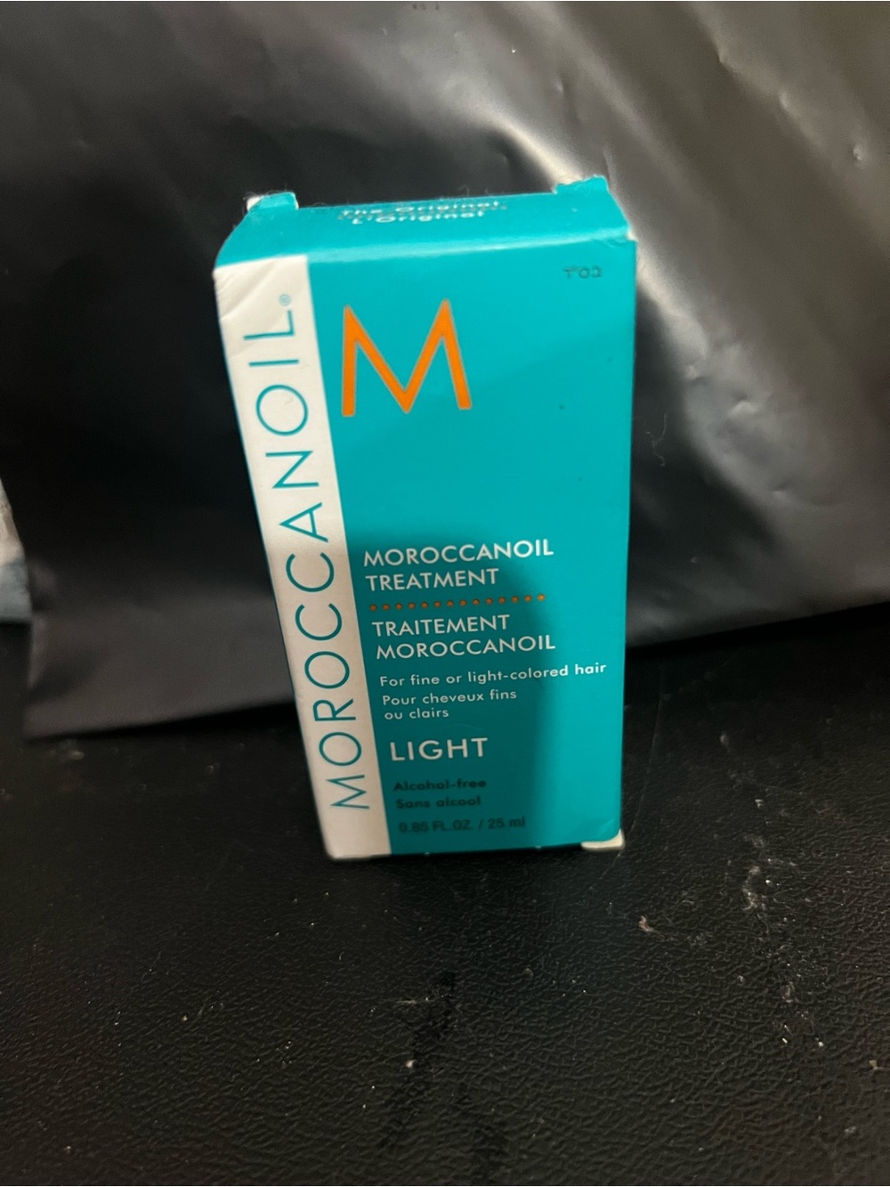 Moroccanoil Light Treatment - Turquoise with Orange Logo